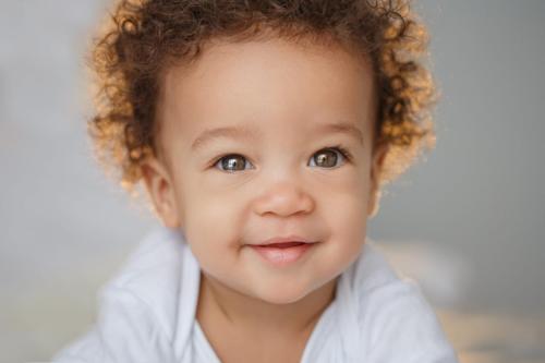 Cute baby with curly hair
